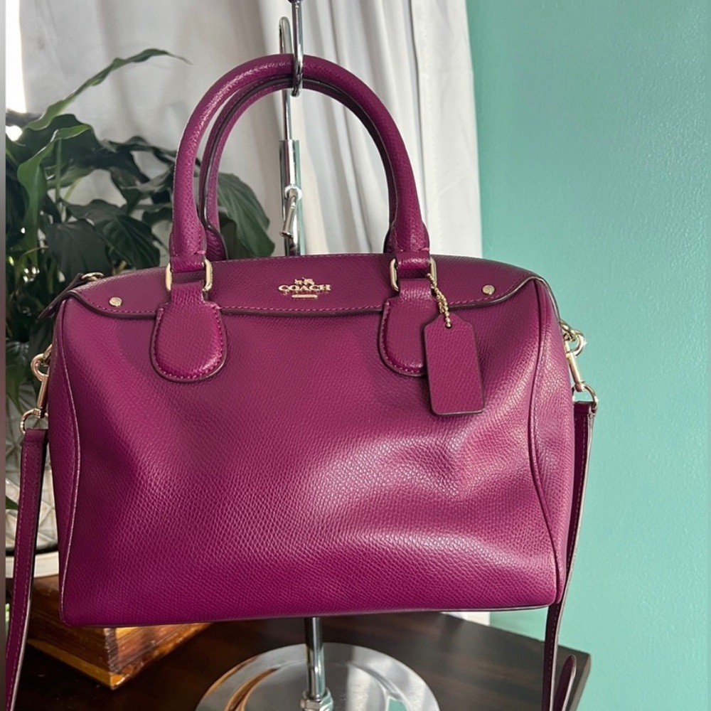 Coach Mini Rowan satchel crossbody in color purple or plum